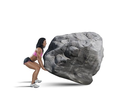 simsearch:400-08505882,k - Muscular woman lifts a big boulder heavy Stock Photo - Budget Royalty-Free & Subscription, Code: 400-08491881