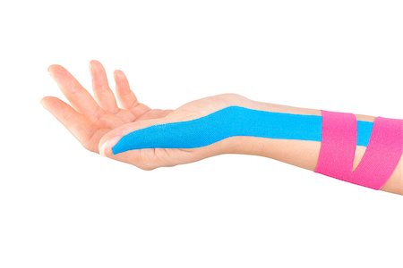 simsearch:400-08318516,k - Kinesio tape on female hand isolated on white background. Chronic pain, alternative medicine. Rehabilitation and physiotherapy. Stockbilder - Microstock & Abonnement, Bildnummer: 400-08492976