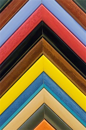 Colored frames for photos and paintings displayed in a row Stockbilder - Microstock & Abonnement, Bildnummer: 400-08493378