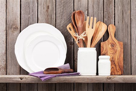 pot holder - Kitchen cooking utensils on shelf against rustic wooden wall Stock Photo - Budget Royalty-Free & Subscription, Code: 400-08493427