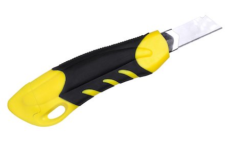 simsearch:625-01263851,k - Single yellow-black office cutter for paper. Isolated on white background. Close-up. Studio photography. Photographie de stock - Aubaine LD & Abonnement, Code: 400-08493591