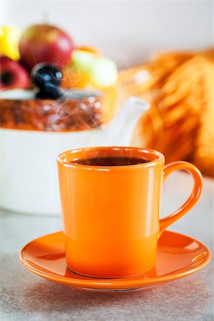 simsearch:400-05311347,k - Colorful orange cup of  black tea on sunlight morning kitchen Stock Photo - Budget Royalty-Free & Subscription, Code: 400-08504028