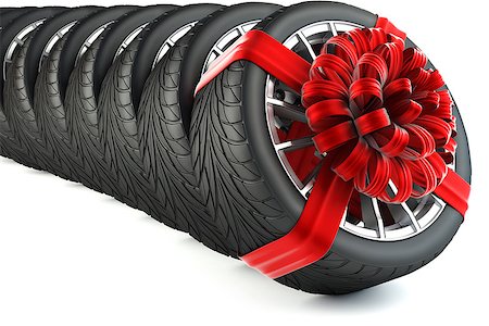 tires wrapped in red gift ribbon with a bow. isolated on white background. Stock Photo - Budget Royalty-Free & Subscription, Code: 400-08504356