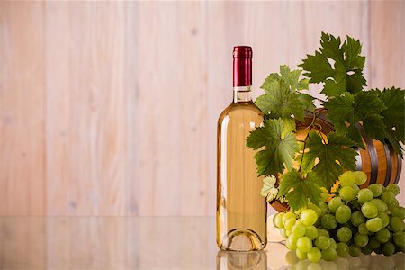simsearch:400-08110621,k - Bottle of wine with a barrel and grapes and grapeleaves Stock Photo - Budget Royalty-Free & Subscription, Code: 400-08505489