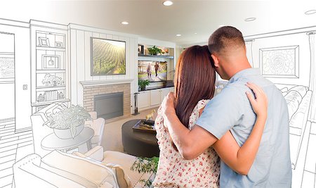 simsearch:400-08254335,k - Curious Young Military Couple Looking Over Custom Living Room Design Drawing Photo Combination. Fotografie stock - Microstock e Abbonamento, Codice: 400-08506307