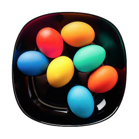 simsearch:400-07921731,k - Easter eggs on a black plate on white background. Isolated with clipping path. Top view. Stock Photo - Budget Royalty-Free & Subscription, Code: 400-08506308