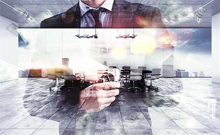 simsearch:400-08812456,k - Successful businessman with a background meeting room Stock Photo - Budget Royalty-Free & Subscription, Code: 400-08507077