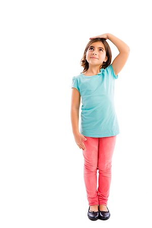 Little girl looking up and checking her size Stock Photo - Budget Royalty-Free & Subscription, Code: 400-08507396