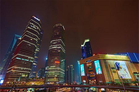 simsearch:400-05157115,k - Shanghai skyline at night out of focus. The blur background Foto de stock - Super Valor sin royalties y Suscripción, Código: 400-08507442