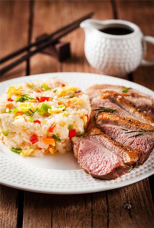 simsearch:400-09225001,k - Asian style food - fried duck breast and jasmine rice with vegetables and eggs Stock Photo - Budget Royalty-Free & Subscription, Code: 400-08507698