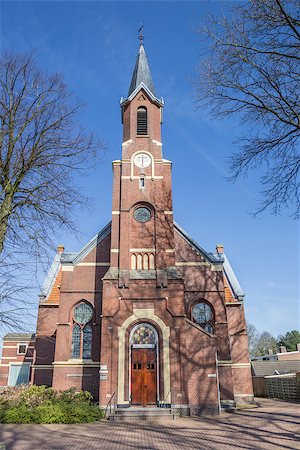 simsearch:400-08432432,k - Old church Ontmoetingskerk in the center of Sappemeer, Netherlands Fotografie stock - Microstock e Abbonamento, Codice: 400-08507986
