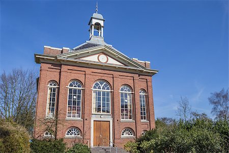 simsearch:400-08432432,k - Old church Doopsgezinde Kerk in the center of Sappemeer, Netherlands Fotografie stock - Microstock e Abbonamento, Codice: 400-08507987