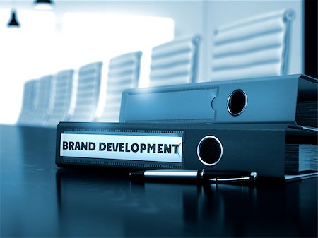 simsearch:400-08187507,k - Brand Development - Concept. File Folder with Inscription Brand Development on Office Working Desk. 3D Toned Image. Stock Photo - Budget Royalty-Free & Subscription, Code: 400-08508145