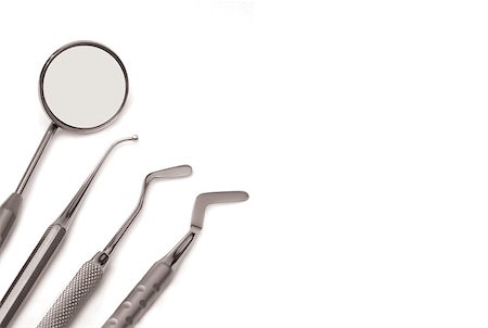 dental technician - Horizontal set of chrome dental tools, viewed from the top isolated on white background Stock Photo - Budget Royalty-Free & Subscription, Code: 400-08500074