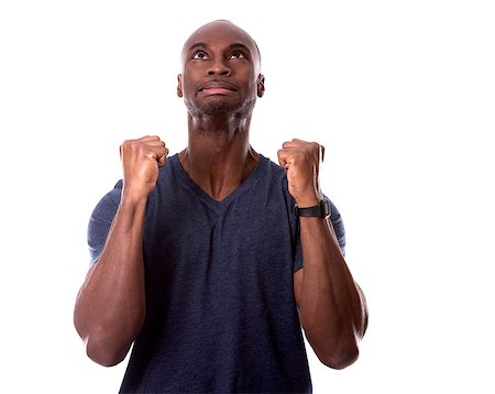 young casual black man scared and hoping on white background Stock Photo - Budget Royalty-Free & Subscription, Code: 400-08500137
