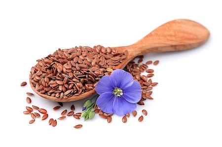 flax seed - Flax seeds with flowers close up on white. Stock Photo - Budget Royalty-Free & Subscription, Code: 400-08500445