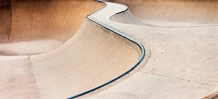 photojope (artist) - Background of an empty bowl with rails in a concrete skate park. Fotografie stock - Microstock e Abbonamento, Codice: 400-08500680