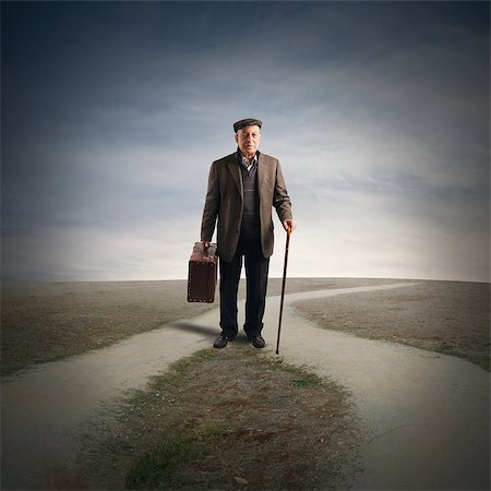 Elderly man at a crossroads of streets Stock Photo - Budget Royalty-Free & Subscription, Code: 400-08502176