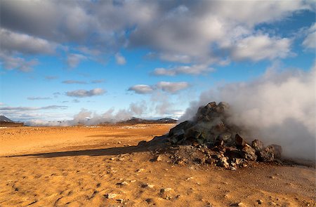 simsearch:400-07122923,k - Horizontal view of steam hot springs coming out of the ground in the volcanic valley near Myvatn baths in Iceland Photographie de stock - Aubaine LD & Abonnement, Code: 400-08502503