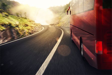 simsearch:400-05724756,k - Bus driving on road with landscape background Stock Photo - Budget Royalty-Free & Subscription, Code: 400-08503203