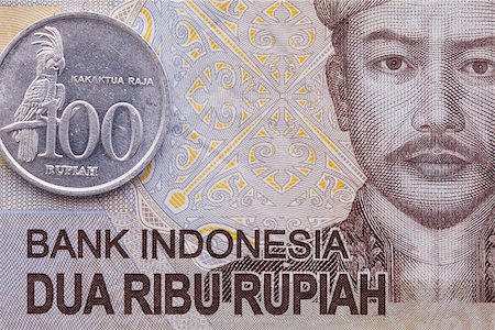 simsearch:400-07218310,k - Indonesian money rupiah banknote and coins, close-up Fotografie stock - Microstock e Abbonamento, Codice: 400-08503269