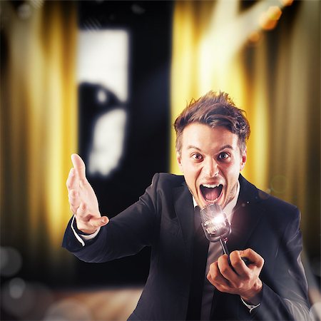 Man screaming at the microphone on theatre Stock Photo - Budget Royalty-Free & Subscription, Code: 400-08503337