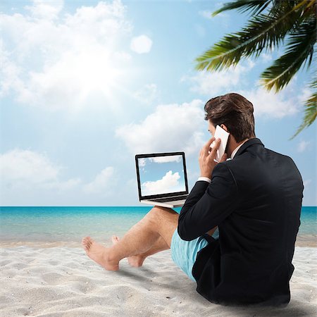 Man at the beach talk with cellular Stock Photo - Budget Royalty-Free & Subscription, Code: 400-08503341