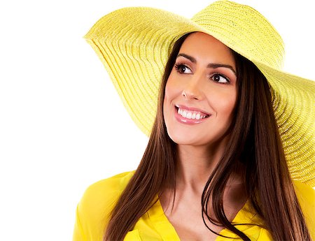 simsearch:400-07986693,k - young woman wearing yellow shirt and hat on white background Stock Photo - Budget Royalty-Free & Subscription, Code: 400-08503634