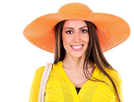 simsearch:400-07986693,k - young woman wearing yellow shirt and orange hat on white background Stock Photo - Budget Royalty-Free & Subscription, Code: 400-08503635