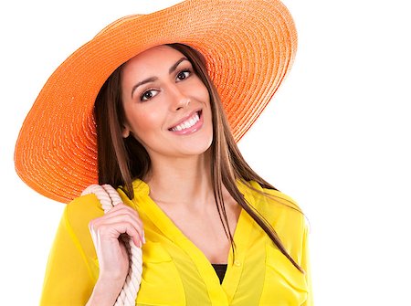 simsearch:400-07986693,k - young woman wearing yellow shirt and orange hat on white background Stock Photo - Budget Royalty-Free & Subscription, Code: 400-08503636