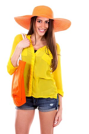simsearch:400-07986693,k - young woman wearing yellow shirt and orange hat on white background Stock Photo - Budget Royalty-Free & Subscription, Code: 400-08503637
