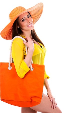 simsearch:400-07986693,k - young woman wearing yellow shirt and orange hat on white background Stock Photo - Budget Royalty-Free & Subscription, Code: 400-08503639