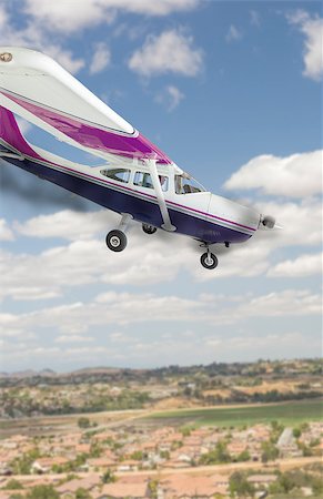 simsearch:400-08503664,k - The Cessna 172 With Smoke Coming From The Engine Heading Down. Stock Photo - Budget Royalty-Free & Subscription, Code: 400-08503660