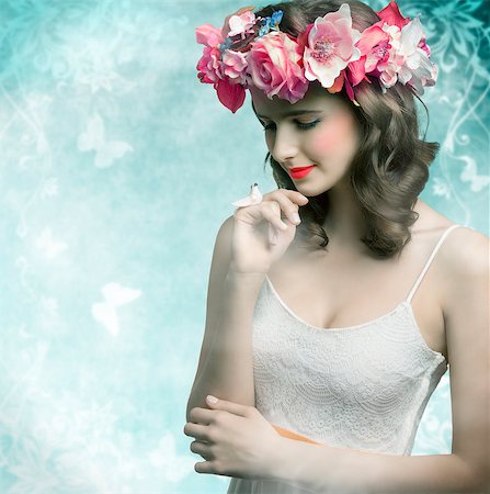 simsearch:400-07986693,k - Beautiful, brunette woman with colorful makeup, wreath of flowers on head, little bird on her finger and wearing white dress. Stock Photo - Budget Royalty-Free & Subscription, Code: 400-08528736