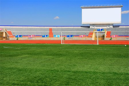 splav (artist) - Football field with goal and tablo on blue sky Foto de stock - Super Valor sin royalties y Suscripción, Código: 400-08529457