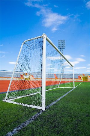 splav (artist) - Football field with goal and tablo on blue sky Foto de stock - Super Valor sin royalties y Suscripción, Código: 400-08529462