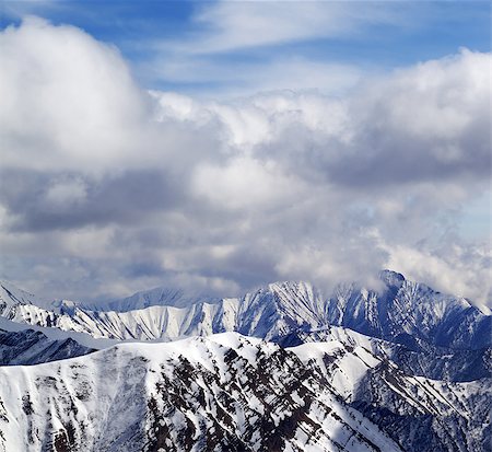 simsearch:400-08530488,k - Winter snowy mountains and cloudy sky. Caucasus Mountains, Georgia, view from ski resort Gudauri. Stock Photo - Budget Royalty-Free & Subscription, Code: 400-08530488