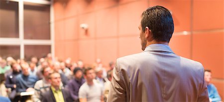 public talk - Speaker at Business Conference with Public Presentations. Audience at the conference hall. Business and Entrepreneurship concept. Background blur. Shallow depth of field. Stock Photo - Budget Royalty-Free & Subscription, Code: 400-08532104