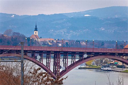 Maribor bridge on Drava river and church on the hill, Slovenia Stock Photo - Budget Royalty-Free & Subscription, Code: 400-08532139