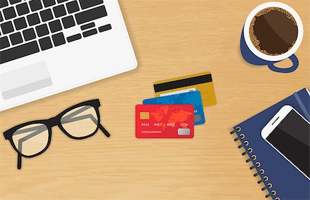 phone pay store - Realistic workplace with three credit cards concept of online payment and shopping. Top view with textured table, laptop, smartphone, diary, glasses, and coffee mug Stock Photo - Budget Royalty-Free & Subscription, Code: 400-08532181