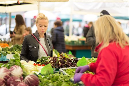 Woman buying fruits and vegetables at local food market. Market stall with variety of organic vegetable. Stock Photo - Budget Royalty-Free & Subscription, Code: 400-08533009