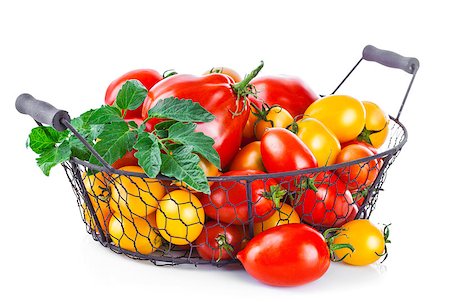 simsearch:400-08377901,k - Basket red and yellow tomatoes from green leaf, isolated on white background Stock Photo - Budget Royalty-Free & Subscription, Code: 400-08533373