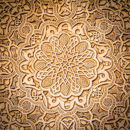 Wall detail of Alhambra UNESCO site in Granada - South of Spain. 600 years old arabic characters. Stock Photo - Budget Royalty-Free & Subscription, Code: 400-08533873