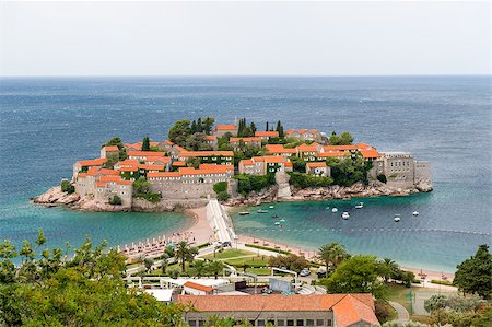 sveti stefan - Sveti Stefan in windy summer day at Adriatic sea. Historical island near Budva, popular luxury resort of Montenegro. Stock Photo - Budget Royalty-Free & Subscription, Code: 400-08554038