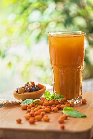fruit non-alcoholic drink with sea buckthorn Stock Photo - Budget Royalty-Free & Subscription, Code: 400-08554967