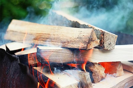 simsearch:400-04863533,k - Fire, flames from wood ember for grill or bbq picnic, Stock Photo - Budget Royalty-Free & Subscription, Code: 400-08555727