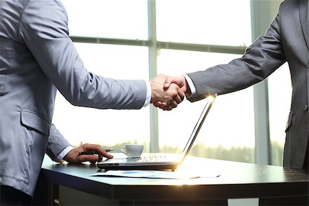 Business handshake. Morning at the office Stock Photo - Budget Royalty-Free & Subscription, Code: 400-08550899