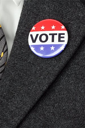 simsearch:400-07838992,k - man with Vote button  pinned on his  suit Stock Photo - Budget Royalty-Free & Subscription, Code: 400-08550953