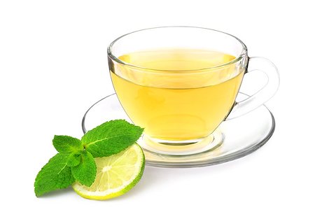 simsearch:400-04176670,k - A cup of green tea with mint sprig and slice of lime isolated on a white background. Foto de stock - Super Valor sin royalties y Suscripción, Código: 400-08551911