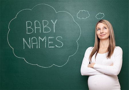 simsearch:400-04205919,k - Pregnant woman trying to choose a name for her baby Stock Photo - Budget Royalty-Free & Subscription, Code: 400-08553117